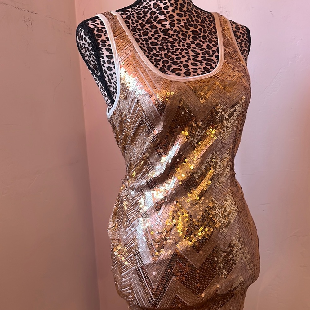 Never worn but no tags. Gold and silver sequin cocktail dress